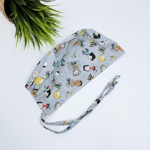 Men's surgical cap. Cartoon Skull tie-back style scrub hat by Paradise Caps.