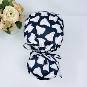 Ghost ponytail scrub cap, Halloween Surgical hat for women. Satin Lined Option Surgical cap by Paradise Caps. Haunted garden - print.