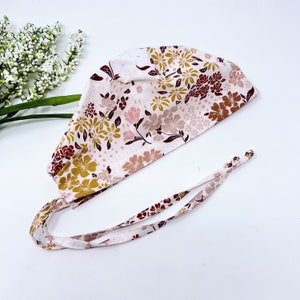 Flower Skull tie-back style scrub cap. Summer surgical scrub cap for women by Paradise Caps.