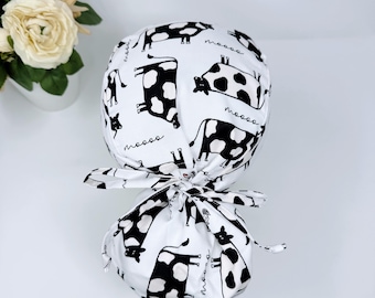 Cow ponytail scrub cap with satin lined option. Funny Surgical cap for women by Paradise Caps.