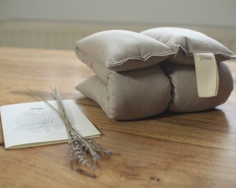 Warm and cold pillow. Neck comfort and warmth pillow. Filled with Organic Rapeseeds and Lavender. 100% Cotton cover.