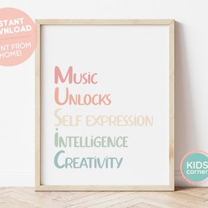 May include: A printable wall art poster with the text "Music unlocks self expression intelligence creativity" in a rainbow gradient color scheme. The poster is framed in a light wood frame and is sitting on a light wood floor.