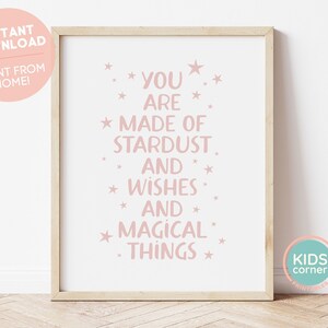 May include: A pink and white printable wall art print with the text "You are made of stardust and wishes and magical things" with stars surrounding the text.