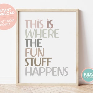 May include: A printable wall art design with the text "This is where the fun stuff happens" in a modern, minimalist style with a neutral color palette of gray, brown, and pink.