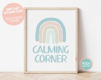 May include: A printable poster with a pastel rainbow and the text "Calming Corner". The poster is framed in a light wood frame.