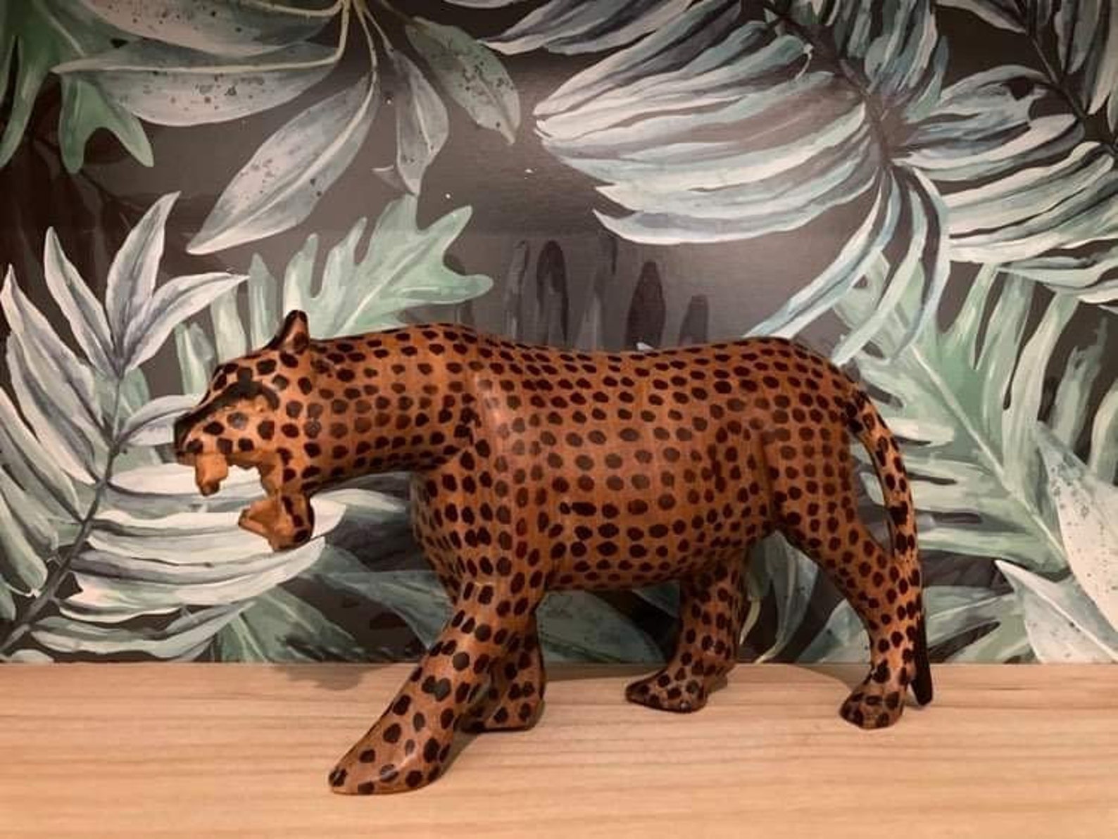 Handcrafted cheetah made of carved wood. Etsy