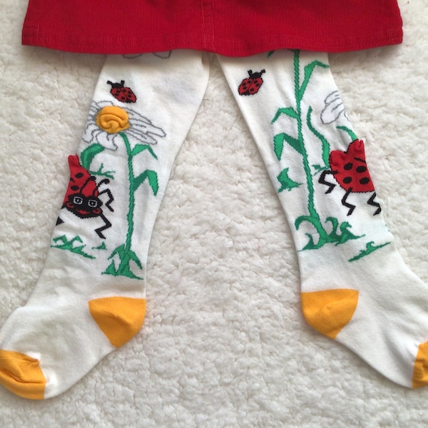 Fun pop-out ladybugs and flowers tights for children