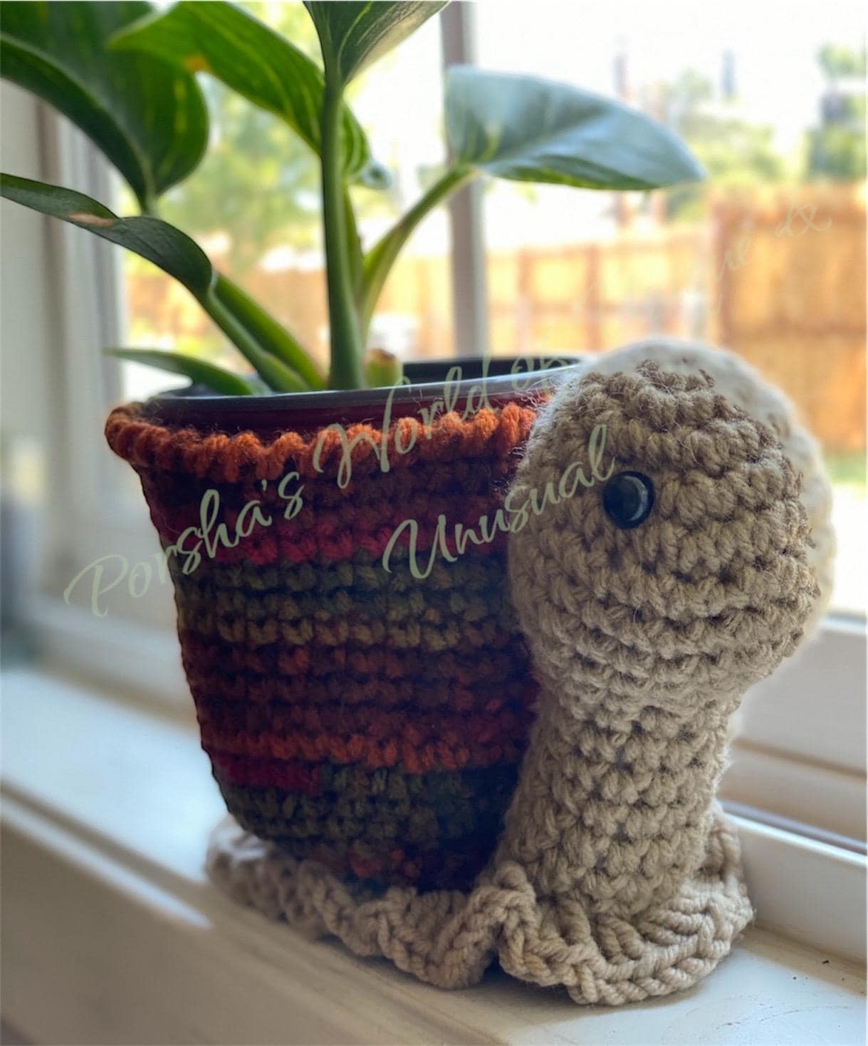 15 Unusual Crochet Patterns for Playful Gifts and Home Decor 9 Crochet Snail Planter