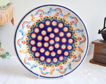 Unikat polish pottery dinner plate with polka dot and unicorn hand painted decoration from Boleslawiec in Poland