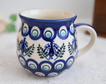Polish pottery peacock tea mug with hand painted decoration made in Poland