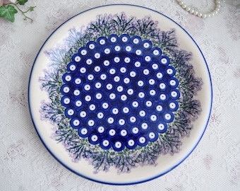 Unikat polish pottery dinner plate with polka dot and floral hand painted lavendar decoration from Boleslawiec in Poland