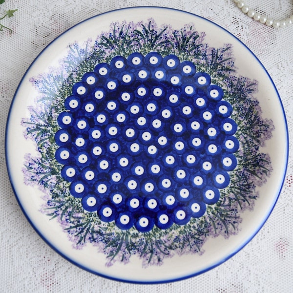 Unikat polish pottery dinner plate with polka dot and floral hand painted lavendar decoration from Boleslawiec in Poland