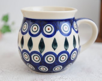 Polish pottery peacock tea mug with hand painted decoration made in Poland