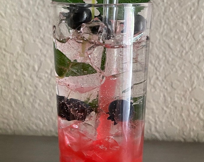 Fake resin cocktail with blueberries drink