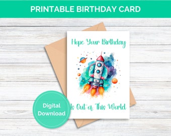 May include: Printable birthday card with a watercolor illustration of a rocket ship flying through space. The text reads "Hope your birthday is out of this world".