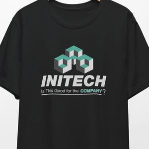 May include: Black t-shirt with the INITECH logo in white and teal. The logo features a geometric design above the word "INITECH" and the phrase "Is This Good for the COMPANY?" below.