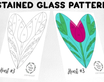 Puede incluir: Un patrón de vitral de una tulipa en forma de corazón con secciones numeradas para colorear. El patrón está en blanco y negro, con el texto "Heart #3" debajo. La imagen está etiquetada como "Stained Glass Pattern" en la parte superior.