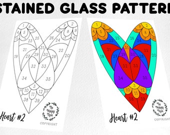 Puede incluir: Un patrón de vitral imprimible de un corazón con 39 secciones numeradas. El patrón está etiquetado como "Heart #2" y tiene derechos de autor de The Makers Trove.