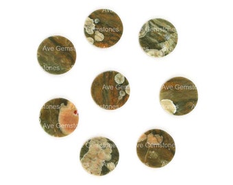 May include: Eight round, green, brown, and white patterned, polished stone cabochons. The stones have a variety of patterns and colors, including green, brown, white, and pink.