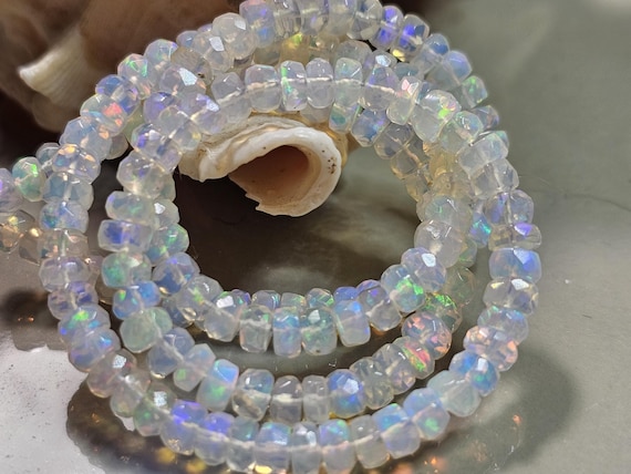 AAAA / Opale Ethiopie Naturelle Blanche Flashs Arc en Ciel Rondelles à Facettes Qualité Supérieure/ Taille Epaisseur 3 mm X   6-7 mm