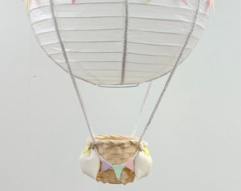 Pastel thema luchtballon kinderkamer lichte schaduw