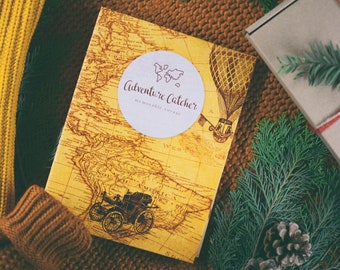 Carnet de voyage dans une boîte cadeau! Adventure Catcher - Édition vintage classique.