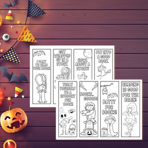 May include: Set of eight black and white Halloween-themed bookmarks featuring spooky characters and sayings like "Get wrapped up in a story" and "Treat yourself to a spooky fun book!"