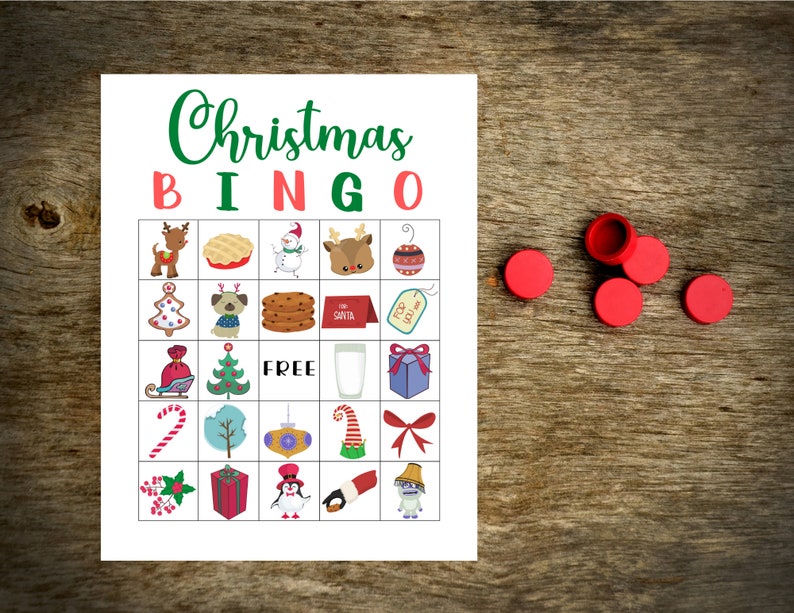 May include: A printable Christmas Bingo card with 25 squares featuring various Christmas-themed images, including a reindeer, a snowman, a gingerbread man, a Christmas tree, a stocking, a candy cane, a gift box, and a penguin. The card is printed on white paper and has a red and green border.