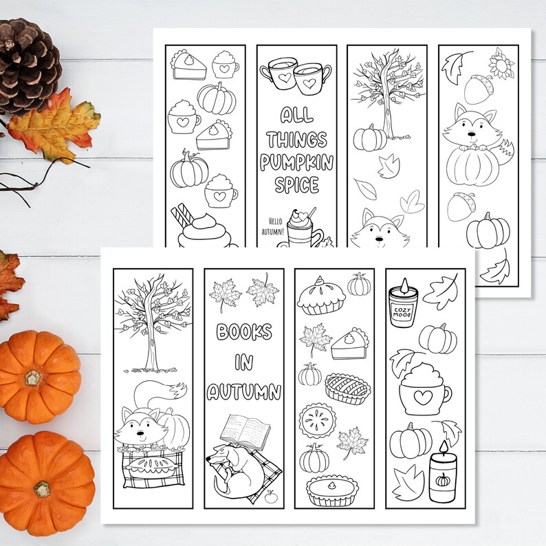 May include: Set of six printable bookmarks featuring autumn themes. The bookmarks include illustrations of pumpkins, pies, leaves, a fox, a dog, a tree, and a cup of coffee. The text on the bookmarks reads "All Things Pumpkin Spice", "Books in Autumn", and "Cozy Mood".