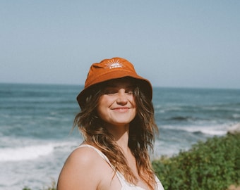 Burnt Orange Bucket Hats with Embroidered Sun Design | Lobos Sun Hats | Boho, Outdoorsy Style