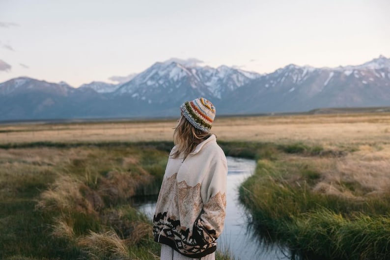 May include: A rustic wooden sign with the text "Welcome to our home" in a handwritten style. The sign features a distressed finish and a simple, inviting design, perfect for a front porch or entryway.