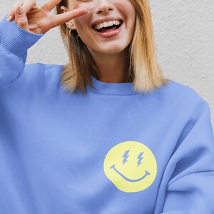 Lightning bolt smiley face sweatshirt clearance