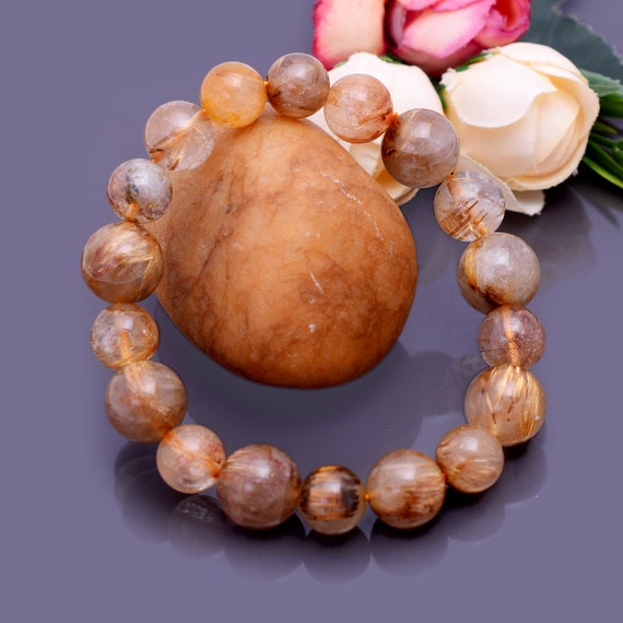 Gold Rutilated Clear Quartz Stretchy Bracelets Gold Rutilated Clear Quartz Stretchy Bracelets