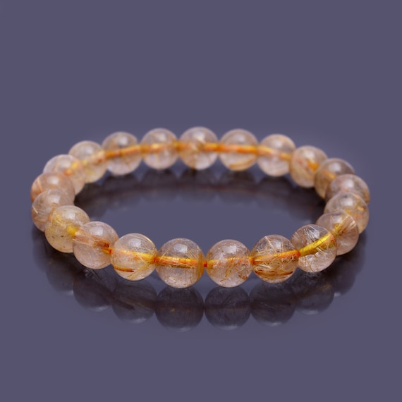 Gold Rutilated Clear Quartz Stretchy Bracelets Gold Rutilated Clear Quartz Stretchy Bracelets