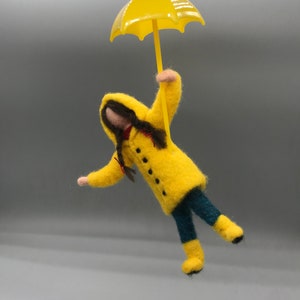 Girl felted with umbrella felt figure