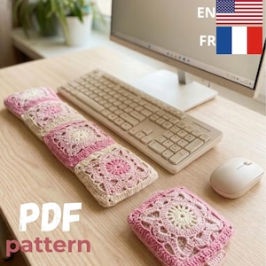 May include: A handmade crochet pattern in pink and cream colors. The pattern is for a keyboard wrist rest and a matching coaster. The text "PDF pattern" is visible in the image.