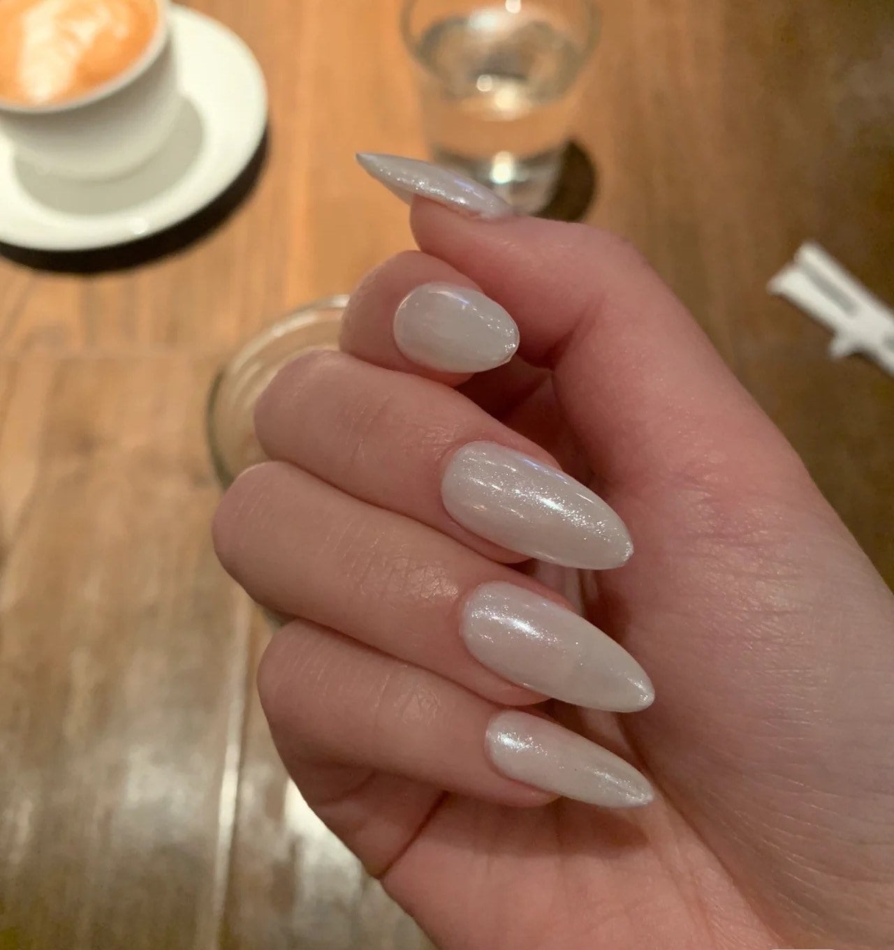 milky white almond nails
