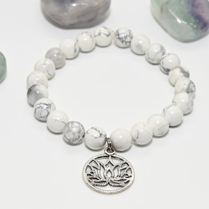Howlite with Zinc Alloy Lotus Flower Charm 8mm round stretch bracelet  7&quot;