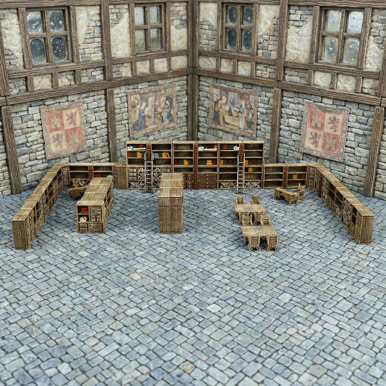 May include: A miniature medieval library diorama with stone walls, wooden bookshelves, tables, and chairs. The scene includes ladders, tapestries, and a cobblestone floor, creating a detailed and immersive setting for tabletop gaming or display.