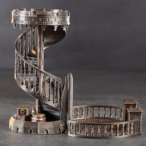 May include: A decorative metal tower with a spiral staircase and a balcony. The tower is made of a dark metal with a bronze finish. The tower is a miniature model and would be a great addition to a fantasy or medieval themed collection.