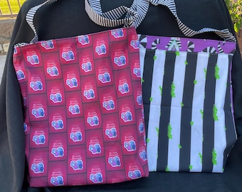 Beetlejuice reversible cross body bag with adjustable strap