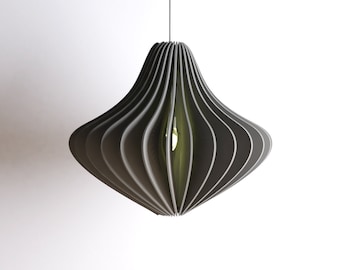 May include: A gray, geometric pendant light with a unique, folded design. The light is suspended from a white ceiling.