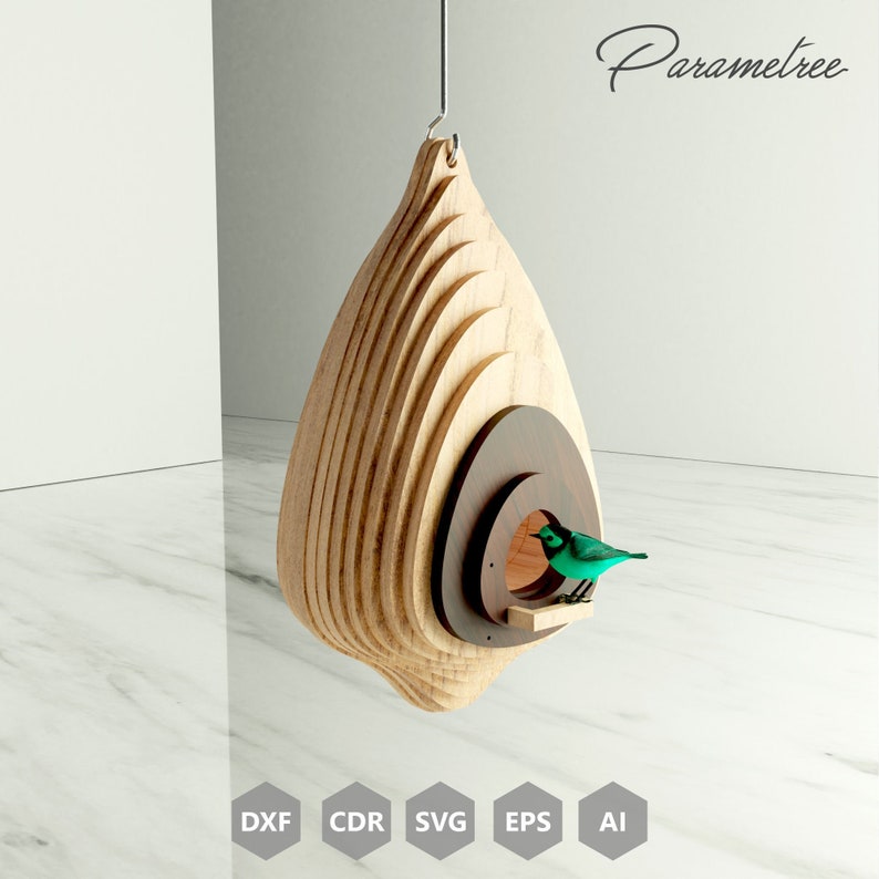 May include: A wooden birdhouse with a layered design, featuring a dark brown circular entrance and a small perch. A small, green bird is perched on the ledge. The birdhouse is suspended by a black string. The word "Parametree" is written in cursive.