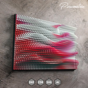 Op de afbeelding: Een abstract wandkunstwerk in rood en wit, gemaakt van kleine vierkanten. De vierkanten zijn in een golvend patroon gerangschikt, waardoor een 3D-effect ontstaat. Het stuk is omlijst in zwart.