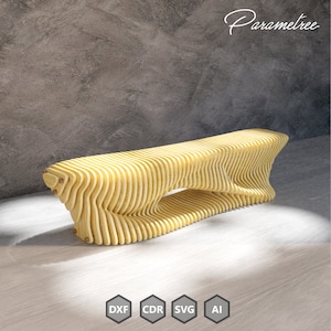 May include: A yellow wooden bench with a unique, organic, wave-like design. The bench is made of thin, layered pieces of wood and has a cutout in the middle. The bench is sitting on a light wood floor in front of a grey concrete wall.