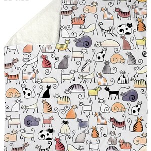 May include: A white sherpa fleece blanket with a pattern of colorful hand-drawn cats. The blanket is 50 inches by 60 inches.