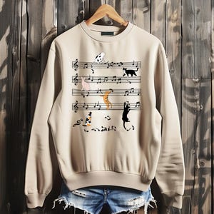 Cat Playing Note Music Shirt - Naughty Cat With Note Music Crewneck Sweatshirt - Cat Music Cotton Tee - Cat Breeds Shirt - Music Lovers Gift
