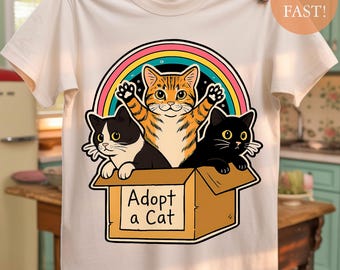 Camiseta unisex "Adopta un gato" - Rescate de gatitos coloridos