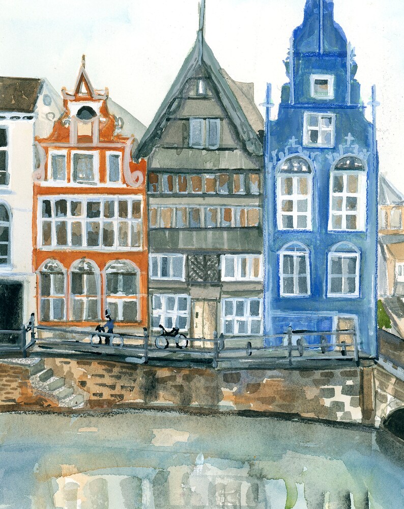 May include: A watercolor painting depicting three multi-story buildings along a canal. The left building is orange, the center is dark gray, and the right is blue. Each structure features multiple windows, gabled roofs, and a stone embankment.