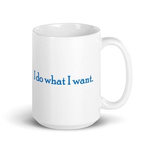 May include: White ceramic coffee mug with a blue inscription that reads "I do what I want."